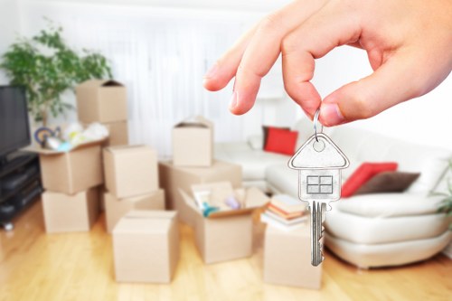 Office removals planning in Motspurpark with packed boxes and desks