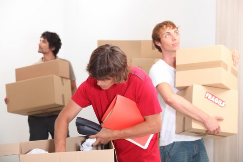 Family home moving items into storage