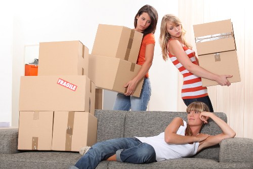 Office furniture being relocated during a business move in Motspurpark
